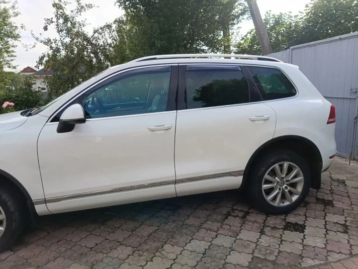 Автомобиль легковые Volkswagen Touareg 2014 года выпуска