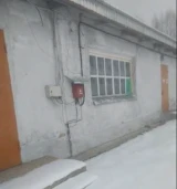 Имущественный складской комплекс, состоящий из 7 одноэтажных нежилых зданий общей площадью 2211,90 кв.м по адресу: Ярославская область, Рыбинский район, с. Никольское, ул. Центральная, д. 55, расположенный на земельном участке площадью 11 580 кв.м