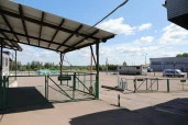 Склад временного  хранения с закрытой  и открытой площадкой  и рефрижератором.