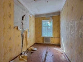 Земельный участок площадью 4 979 кв.м. с расположенными на нем зданиями врачебной амбулатории, гаража, склада по адресу: Липецкая область, м.о. Добровский, с. Ратчино, улица Ленина, д.7