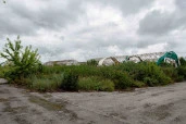 Единый недвижимый комплекс (свинотоварная ферма в составе 39 зданий), общая площадь 14 400,5 кв. м., местоположение: Липецкая область, р-н Чаплыгинский, примерно в 750 м по направлению на северо-восток от п Рощинский (с/п Шишкинский сельсовет)