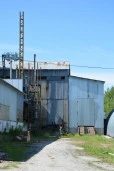Крупяной завод полного цикла, состоящий из 9 зданий и 2 земельных участков с оборудованием.