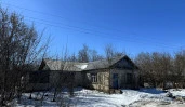 Здание свободного назначения с земельным участком.
