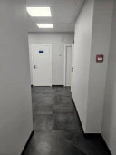 Административное здание с земельным участком в центре Соснового Бора