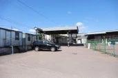 Склад временного  хранения с закрытой  и открытой площадкой  и рефрижератором.