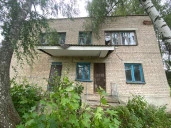 Нежилое здание, площадью 1 131 кв.м. и земельный участок в п. Колпна