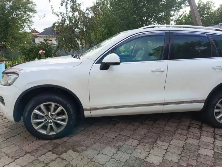 Автомобиль легковые Volkswagen Touareg 2014 года выпуска