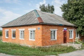 Здание с земельным участком в с. Лавы