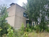 Нежилое здание, площадью 1 131 кв.м. и земельный участок в п. Колпна