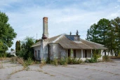 Земельный участок общей площадью 19 920 кв.м. и 16 объектов недвижимости.