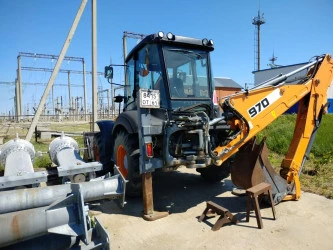 Экскаватор-погрузчик TEREX 970