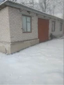 Имущественный складской комплекс, состоящий из 7 одноэтажных нежилых зданий общей площадью 2211,90 кв.м по адресу: Ярославская область, Рыбинский район, с. Никольское, ул. Центральная, д. 55, расположенный на земельном участке площадью 11 580 кв.м