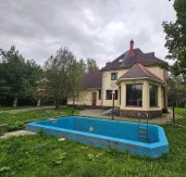 Коттедж  318,3 кв. м с участком 1 200 кв. м в дер. Аро
