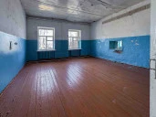 Земельный участок площадью 4 979 кв.м. с расположенными на нем зданиями врачебной амбулатории, гаража, склада по адресу: Липецкая область, м.о. Добровский, с. Ратчино, улица Ленина, д.7