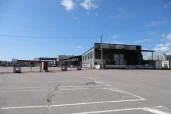 Склад временного  хранения с закрытой  и открытой площадкой  и рефрижератором.