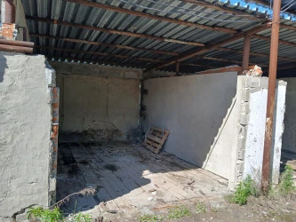 Гараж, общей площадью 20,5 кв.м  с кад. номером 86:13:0201003:600, расположенный на земельном участке, общей площадью 26 кв.м, с кад. номером 86:13:0202001:365 по адресу: ХМАО, г Нягань, пр-кт Нефтяников, д 7, корп. 3, бокс 21